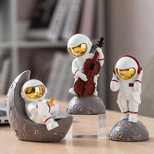 Load image into Gallery viewer, Astronaut Band Figurine
