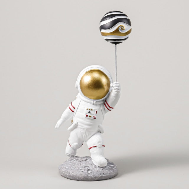 Astronaut with Planet Balloon